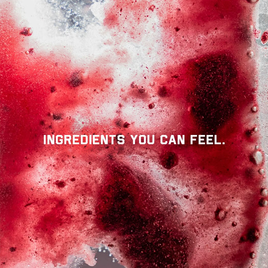 Promotional banner showing headline INGREDIENTS YOU CAN FEEL over a close-up of red fizzy liquid with bubbles